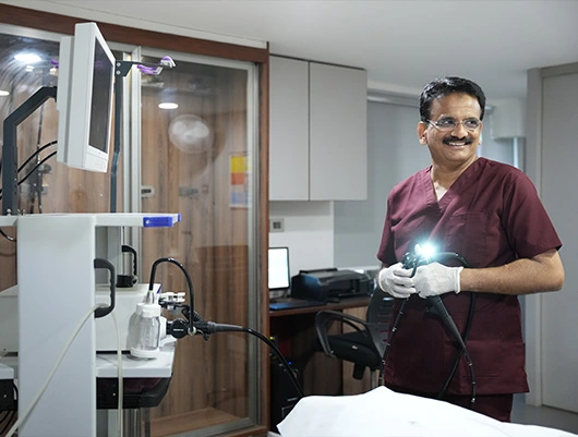 gastroenterology doctor setting colonoscopy machine